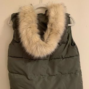 Olive green puffer vest with faux fur hood